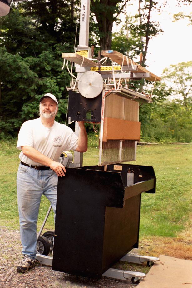 Jerry Korb uses a Genie Lift to hoist the frame out of Mellotron FX Console #10006