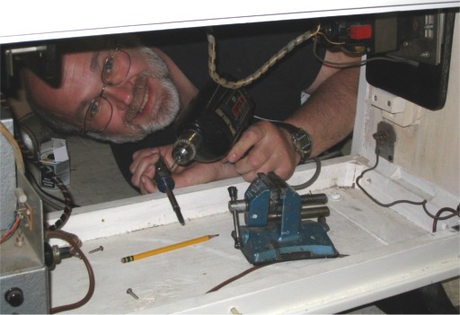 Jerry Korb inspects Mellotron M400 (or is he changing the oil in the Bentley?)